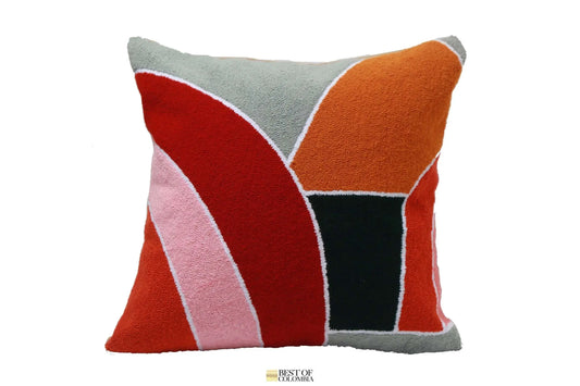 A square-shaped pillow with a geometric pattern featuring lines and shapes in red, orange, pink, and black colors on a white background.